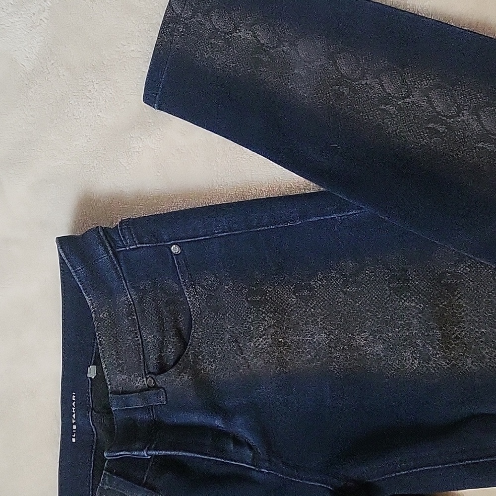 Elie Tahari blue jeans with gray snake print.